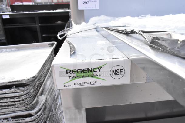 Regency 600EBTB2472R 24"x72" stainless steel sliding door table, new with scratches, includes drawers and 6" backsplash. NSF certified.