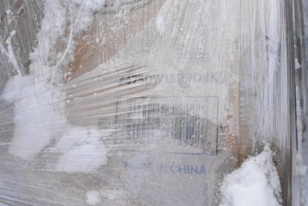 Plastic-wrapped scratch and dent items with visible barcode and "Made in China" text. Includes trash can, Steelton shelving units.