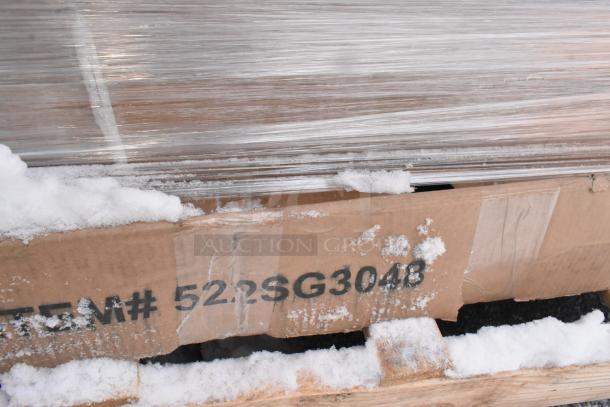 Pallet with shrink-wrapped items including scratch and dent trash can, Steelton shelving units. Item# 522SG3048 marked on box.