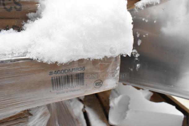 Pallet of brand new scratch and dent items, including drop mat shelves and outdoor tables. Marking: #460DM1836, Made in Vietnam.