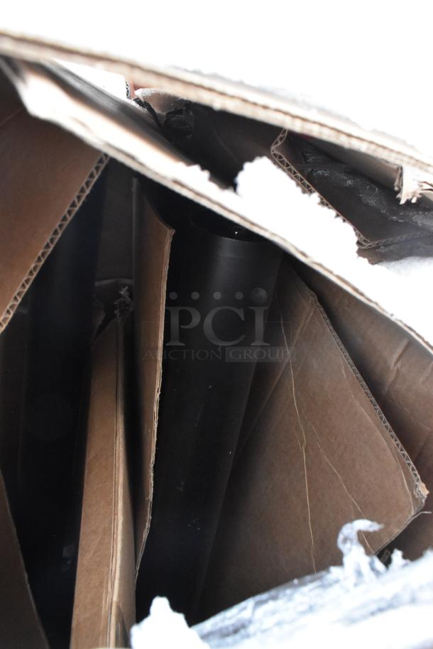 Pallet with various items, including a Choice 125 lb. black mobile ice bin, new in original packaging.