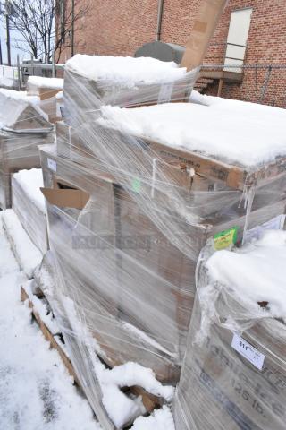 Pallet lot of various items, including drying rack and chef base drawer assembly, wrapped in plastic with snow. Condition: scratch and dent. Tags visible with numbers.