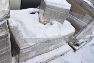 Pallet of various scratch and dent items wrapped on pallets in snow, includes Acopa 64 oz. satin copper pitcher.