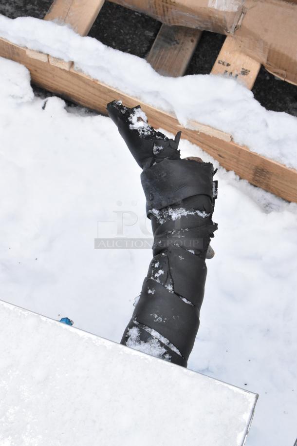 Metal commercial evaporator fan with 13,000 BTU capacity, 220 volts, 1 phase. Appears in good condition on snowy surface.