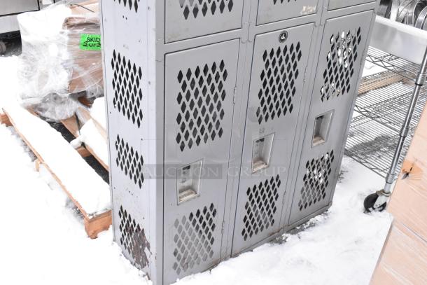 Gray metal 6 cubby locker, used, with diamond ventilation pattern, visible brand logo, and minor rust at the base.