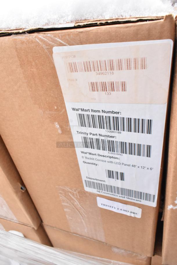 Cardboard box showing label with Wal*Mart and Trinity part numbers. Contains 6" backlit cornice with LED panel, 48"x12"x6".