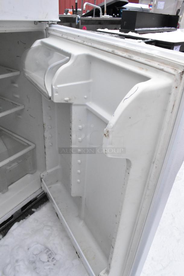 Maytag M1TXEGMYW01 reach-in cooler with freezer, showing interior door detail. Moderate wear, 115 volts, 1 phase.