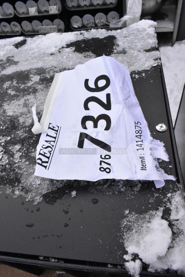 7 new scratch and dent items, including Ashland PolyTrap 4875 grease trap, with ice-covered auction label.