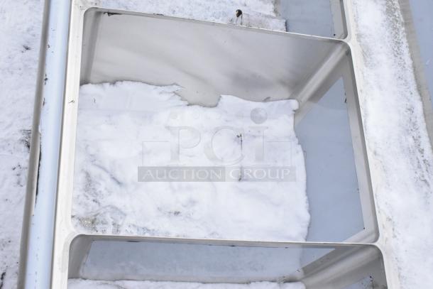 Brand new Regency 600DDTS384RT 3-compartment sink, 16-gauge, 16"x20"x14" bowls, right drainboard, scratch and dent condition.