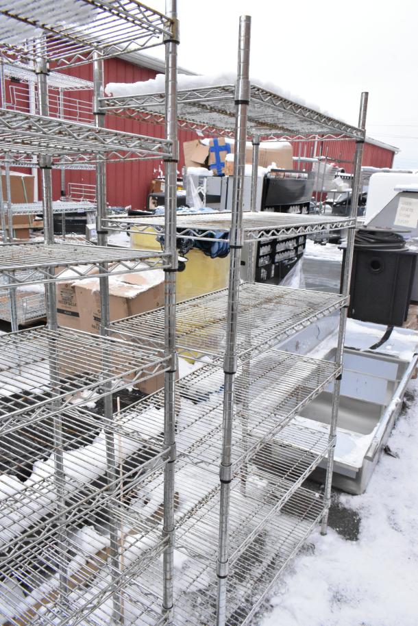 Two chrome finish wire shelves, five-tier each, sturdy condition, ideal for storage. Snow-covered outdoor setting.