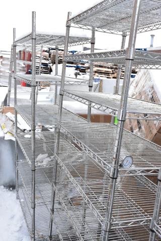 Two chrome finish wire shelves, in good condition, outdoor setting. Dismantling and freight required for buyers.