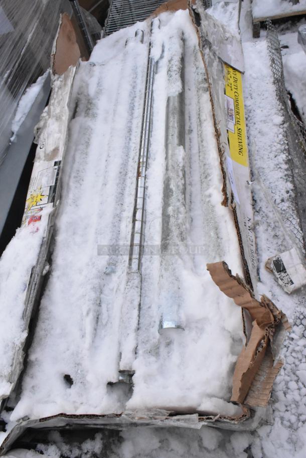 Heavy-duty commercial shelving unit, metal components exposed under snow, packaging partially damaged, label visible.