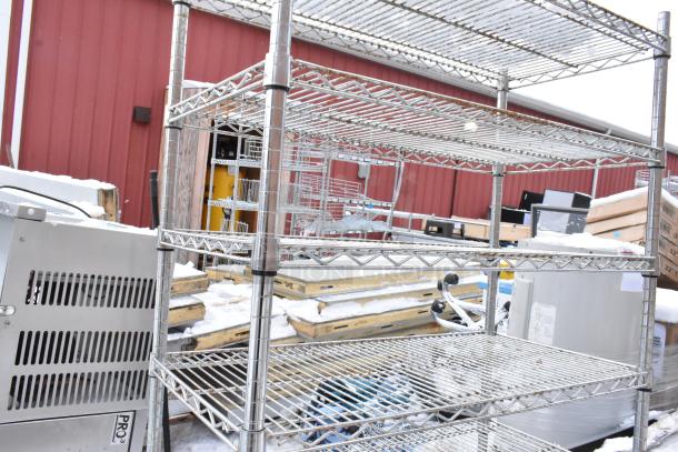 Chrome finish 8-tier wire shelving unit, sturdy frame, outdoor setting. Buyer must dismantle for shipping. Consider freight charges.