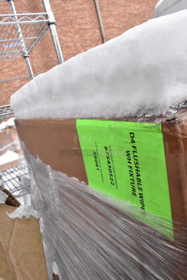 Pallet of various items with visible label: "D4 Flushable Wipe WH Fixture, Walmart Item 675430522, Stock 58081," wrapped in plastic.