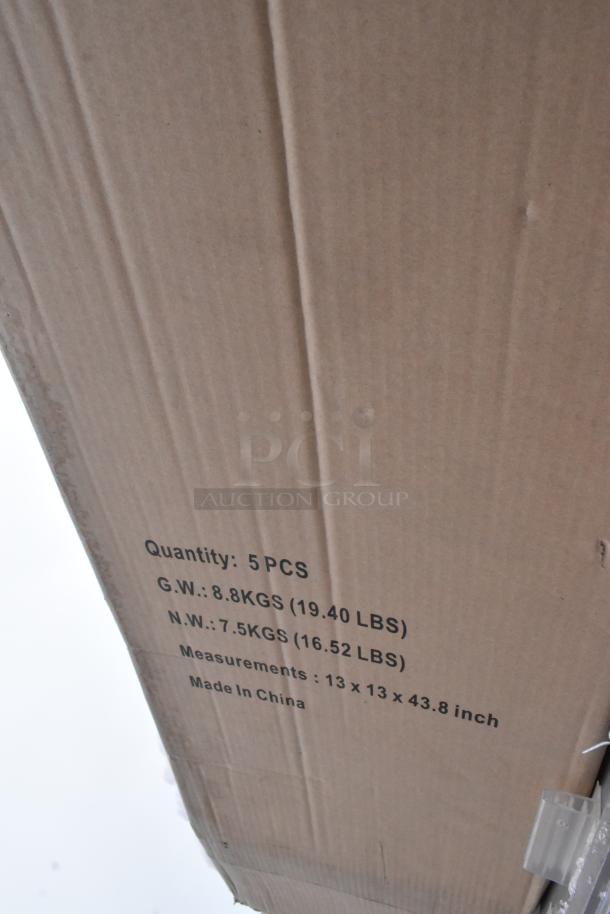 Cardboard box labeled "Quantity: 5 PCS, 13 x 13 x 43.8 inch," holding 3 various gray metal pieces.