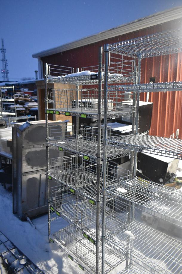6-tier chrome wire shelving unit, outdoor setting, snow-covered top shelf, sturdy metal construction. Buyer must dismantle.