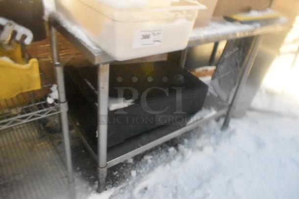Stainless steel table with under shelf, includes poly bins, trash can, and glass racks. Good condition, label "366".