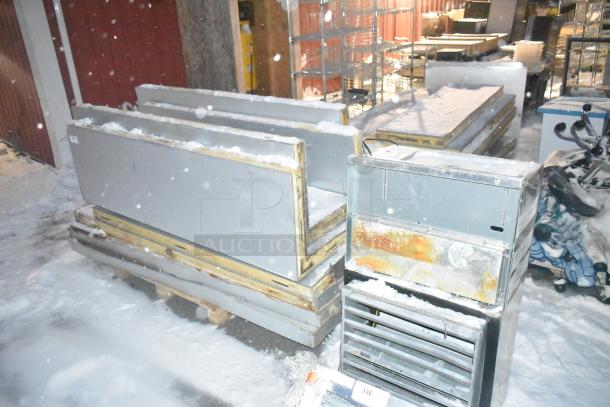 SELF CONTAINED Walk In Box with PTN047M6BE compressor in snowy condition, 208-230 volts, 1 phase.