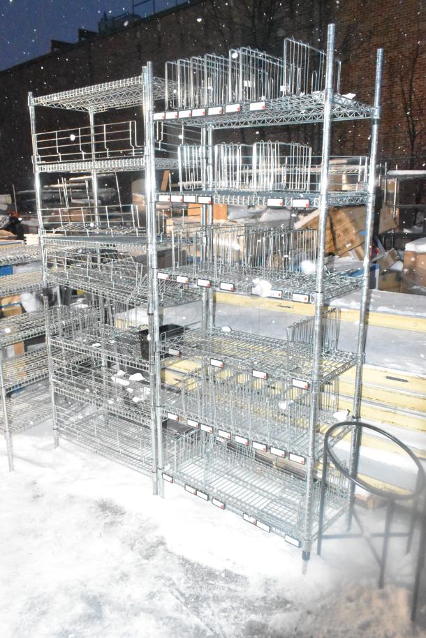 Two chrome wire shelving units outdoors, snow-covered. Six-tier storage with grid baskets. Buyer dismantles; consider freight.