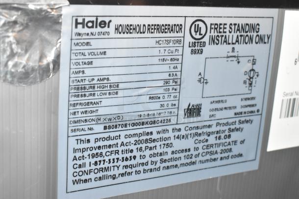 Haier HC17SF10RB label, 1.7 Cu. Ft, 115V, 60Hz, 1.4A, R600a, 30 lbs. Complies with safety standards. Made in China.