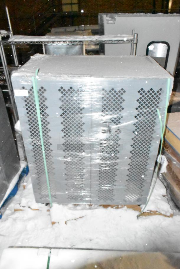 Winholt gray metal storage cage with perforated sides, wrapped in protective plastic. Good condition, ideal for secure storage.
