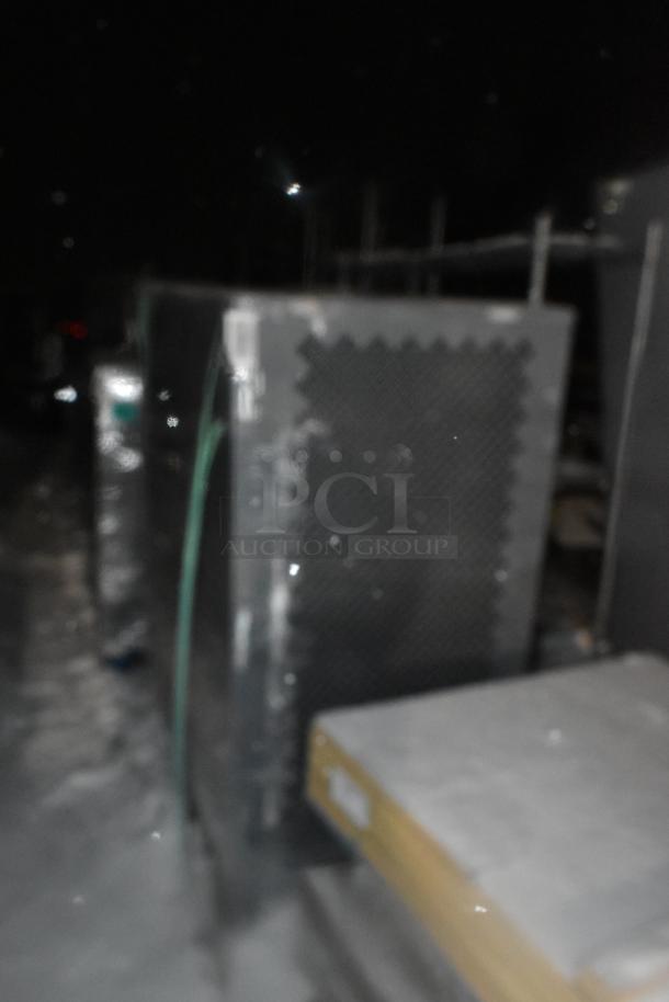 Winholt gray metal cage, sturdy design, features perforated panels for airflow, in good condition, suitable for storage.