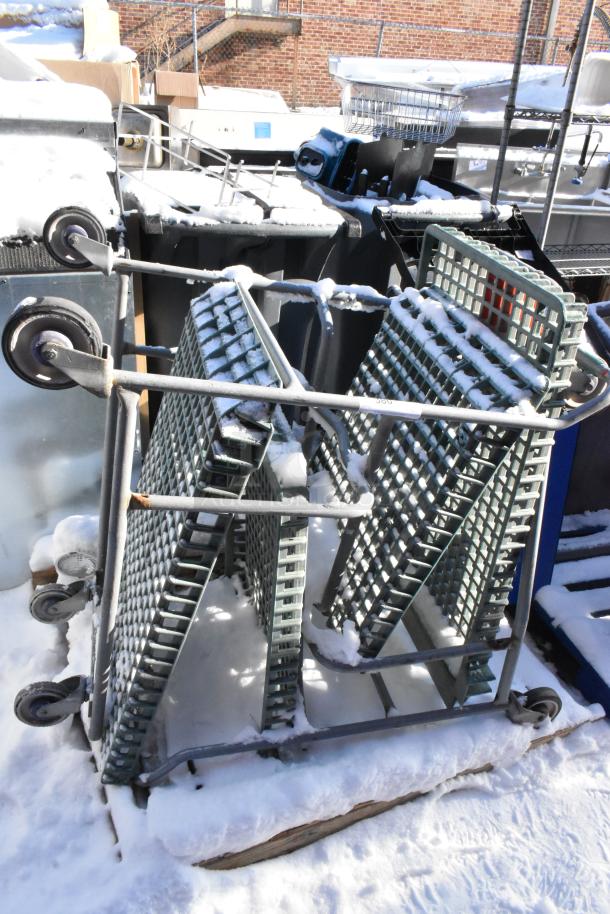 Chrome finish cart with commercial casters, used condition, sturdy construction, visible wear. Ideal for industrial settings.