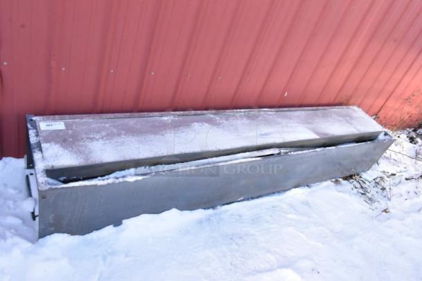 Berner Metal Unit, snow-covered, outdoor condition. Industrial design, metal construction. Tag indicates item number 382.