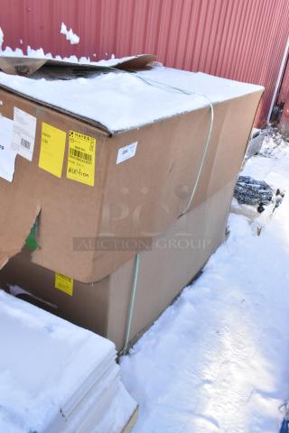 Large cardboard box labeled for auction containing 2 brand new scratch and dent items, including a 3-compartment recycling bin.