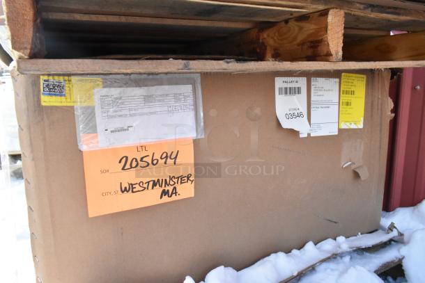 Cardboard box on a pallet, labeled with packing list and shipping tags for 3-compartment recycling bin, Westminster, MA.