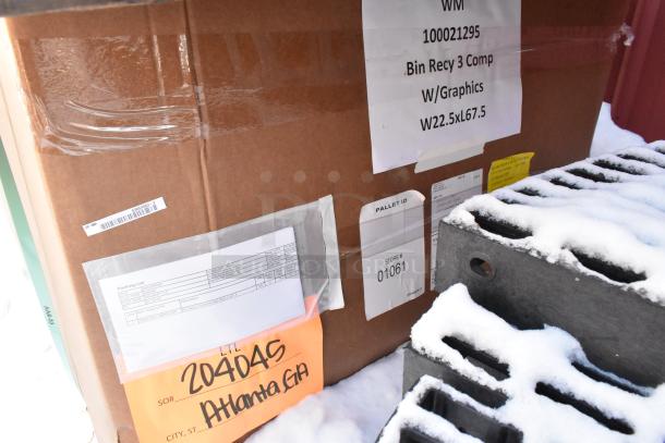 Box labeled "WM 100021295 Bin Recy 3 Comp W/Graphics W22.5xL67.5" indicating a three-compartment recycling bin. Snow-covered items beside the box.