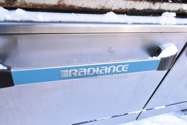 Radiance stainless steel commercial 10 burner range, features 2 ovens, over shelf, backsplash, with visible branding label.