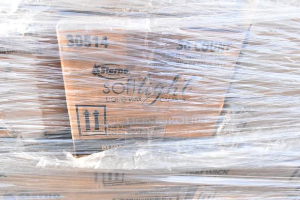 Pallet of Sterno Softlight liquid wax candles, 36 count boxes, wrapped in plastic, labeled with product details.