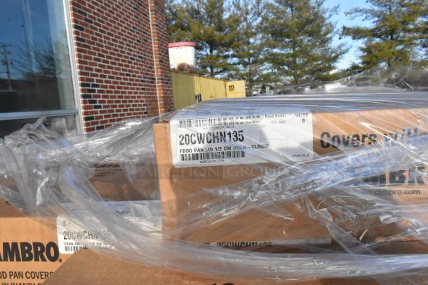 Boxes labeled Cambro 20CWCHN135, containing food pan covers. Sealed in clear plastic wrap, new condition.