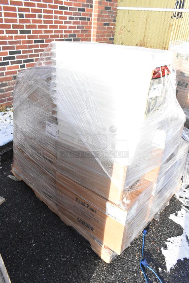 Pallet of 12 new Cambro food pans and storage containers, wrapped in plastic. Some boxes marked "scratch and dent."