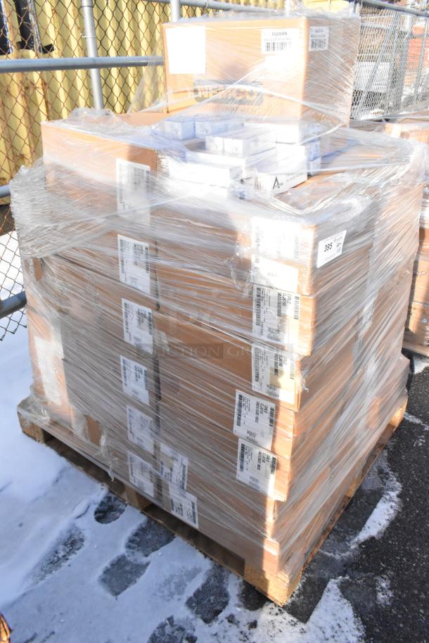 Shrink-wrapped pallet of 65 brand new scratch and dent items, including Cambro lids and Nemco slicers, with visible labels.