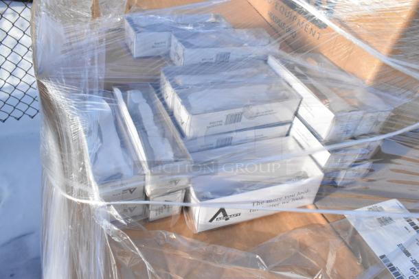 Plastic-wrapped pallet containing boxes of new Adcraft Baguette BA-LTS/B teaspoons, labeled for auction sale.