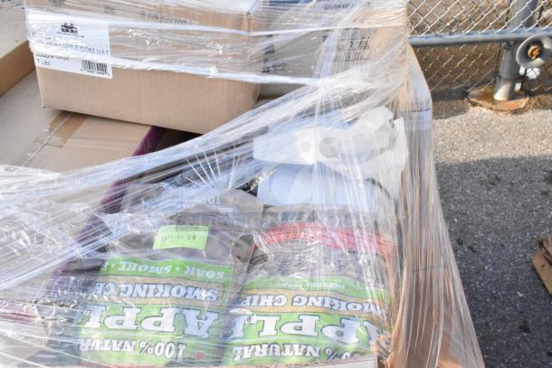 Plastic-wrapped pallet with 30 brand new scratch and dent items including Carlisle serving bowls and melamine side dishes.