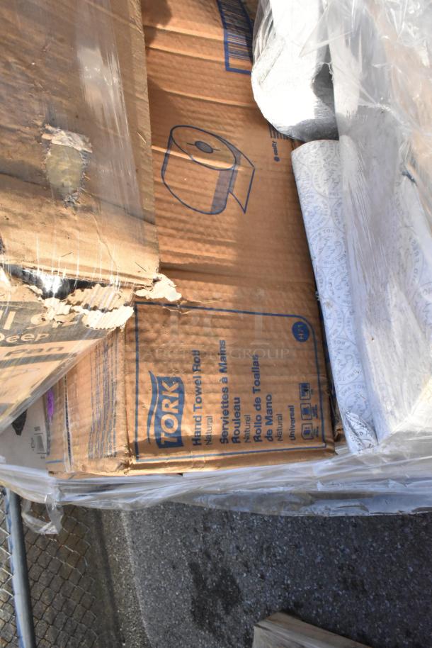 Pallet with 23 new scratch and dent items, including Tork hand towel rolls, cold cups, and lid organizer.