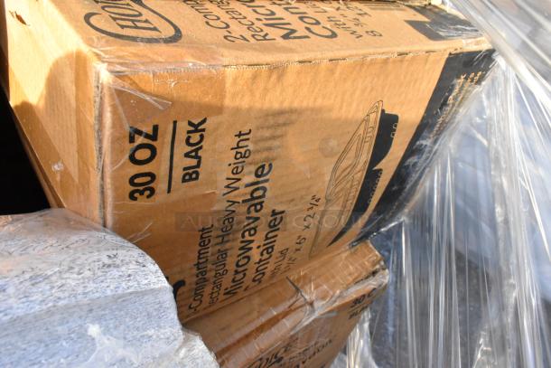 Boxes of 30 oz black microwavable containers, scratch and dent condition, part of a 23-item lot including cups and organizers.