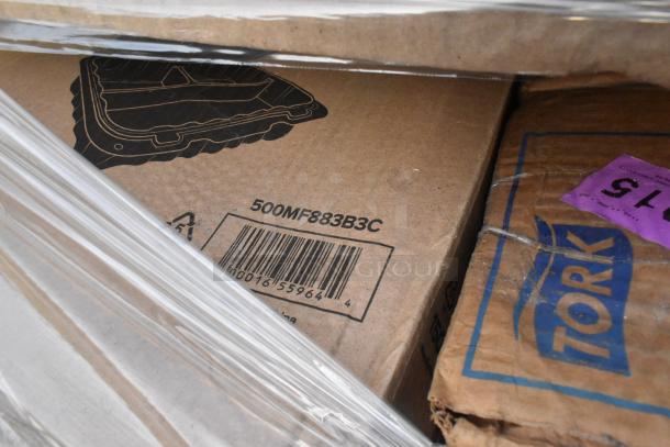 Auction lot of 23 brand new scratch and dent items including cold cups, containers, and paper towels. Boxes labeled "Tork," barcode shown.