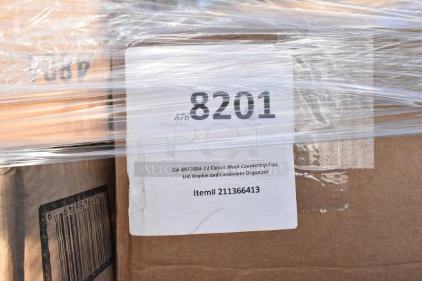 Pallet of assorted scratch and dent items; includes cold cups, containers, paper towels, lid organizer. Visible label: Cal-Mil 3664-13.