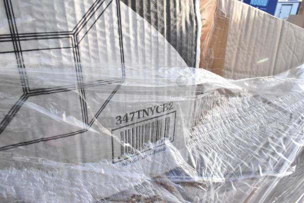 Box with barcode 347TNYCB2 under plastic wrap, containing 20 new items, including dispensers, cup sleeves, containers.