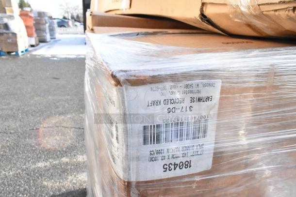 Stack of palletized boxes with visible barcode and label for Earthwise Recycled Kraft. Items include lug rack, soap dispenser, baguette bags. Slight scratches and dents.