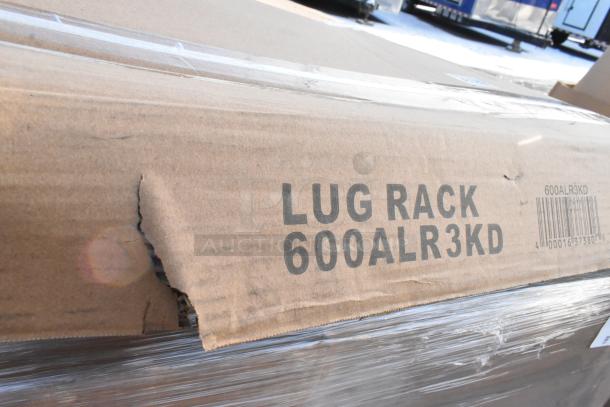 Cardboard box labeled "Lug Rack 600ALR3KD," showing a tear. Scratch and dent condition.