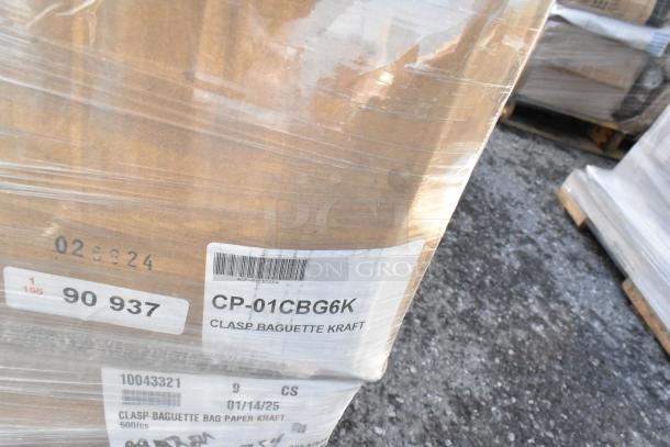 Pallet of clasp baguette bags, labeled CP-01CBG6K, packaged in kraft paper. Condition: scratch and dent. 500 bags per case.