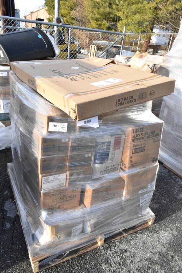 Pallet of 38 new scratch and dent items including lug rack, soap dispenser, baguette bags in sealed boxes. Visible labels indicate mix of assorted items.