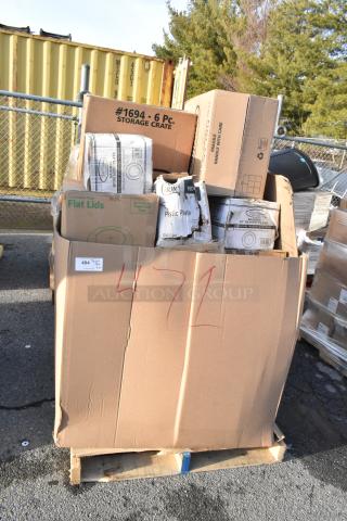 Large box of brand new scratch and dent items, including take-out containers and hot cups, stacked on a pallet. Marked "471."