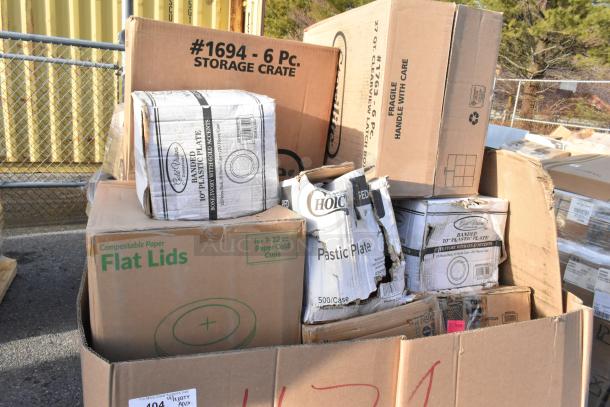 Assorted boxes of new catering items with signs of wear; includes plates, lids, and cups. Brand labels visible.