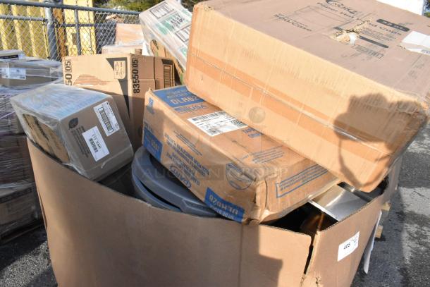 Box of 24 new scratch and dent items, including trash cans, napkins, and hot cups. Packaging shows shipping labels.